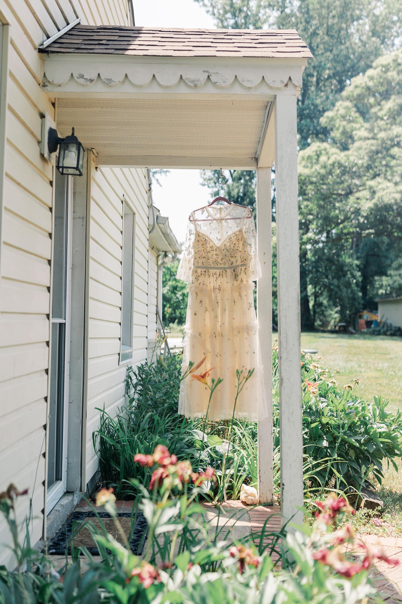 a garden style wedding theme with a dress from the company needle and thread
