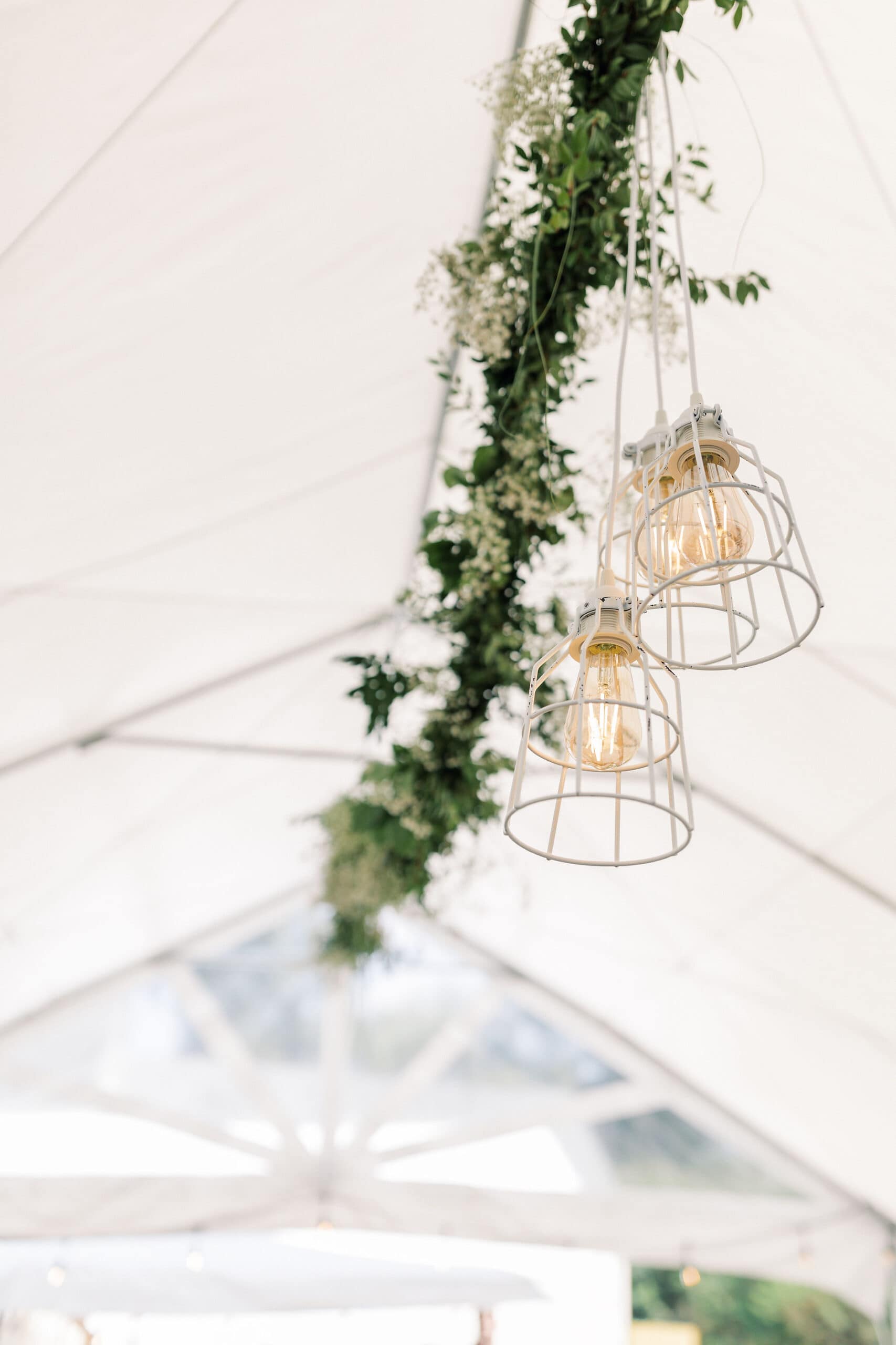 floral and lights for a backyard wedding garden party style