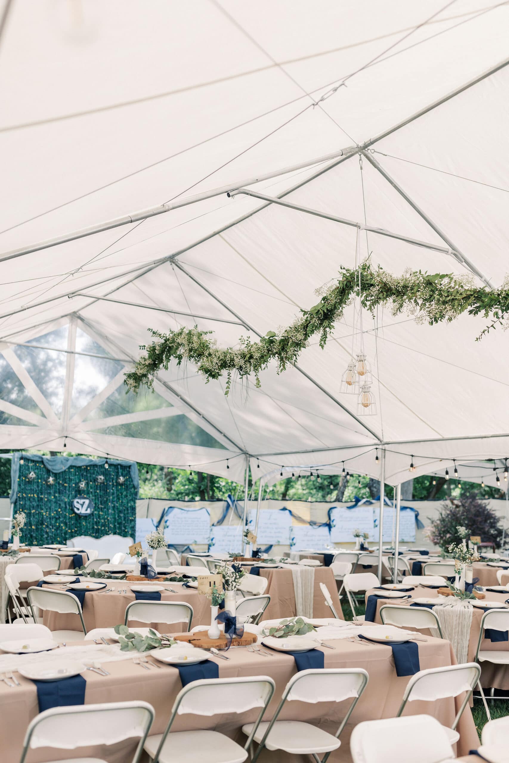 a white tent with the knot inspired designs for a maryland wedding