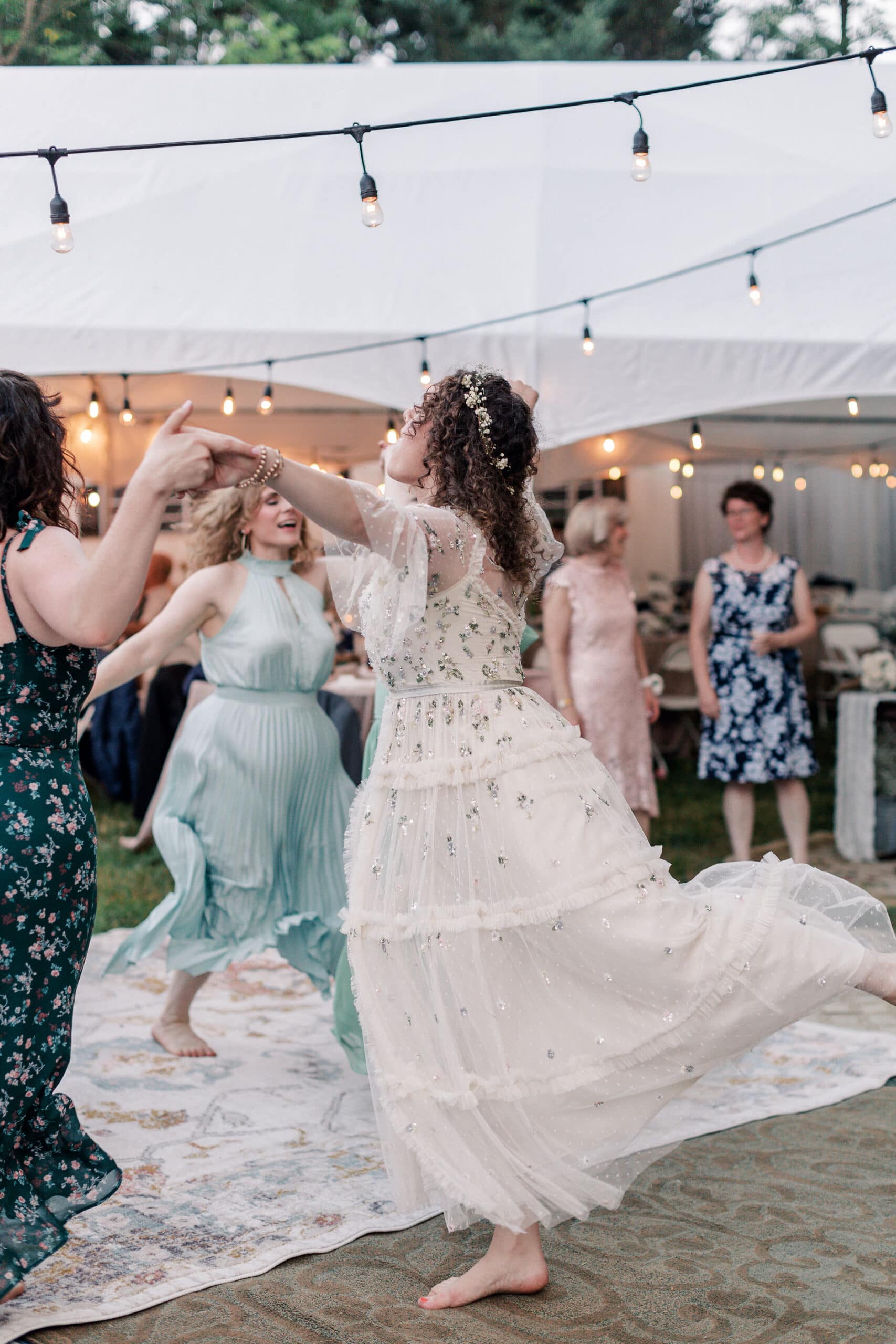 a backyard dance party at a garden wedding