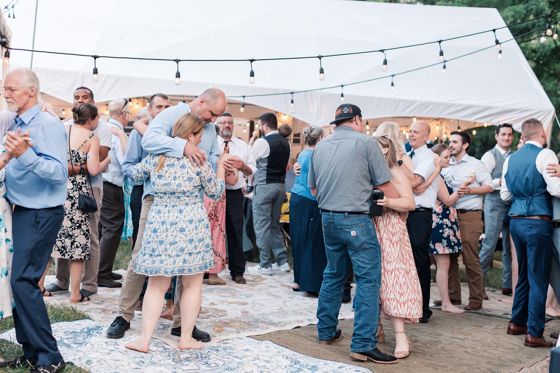 a back yard dance party at a garden wedding