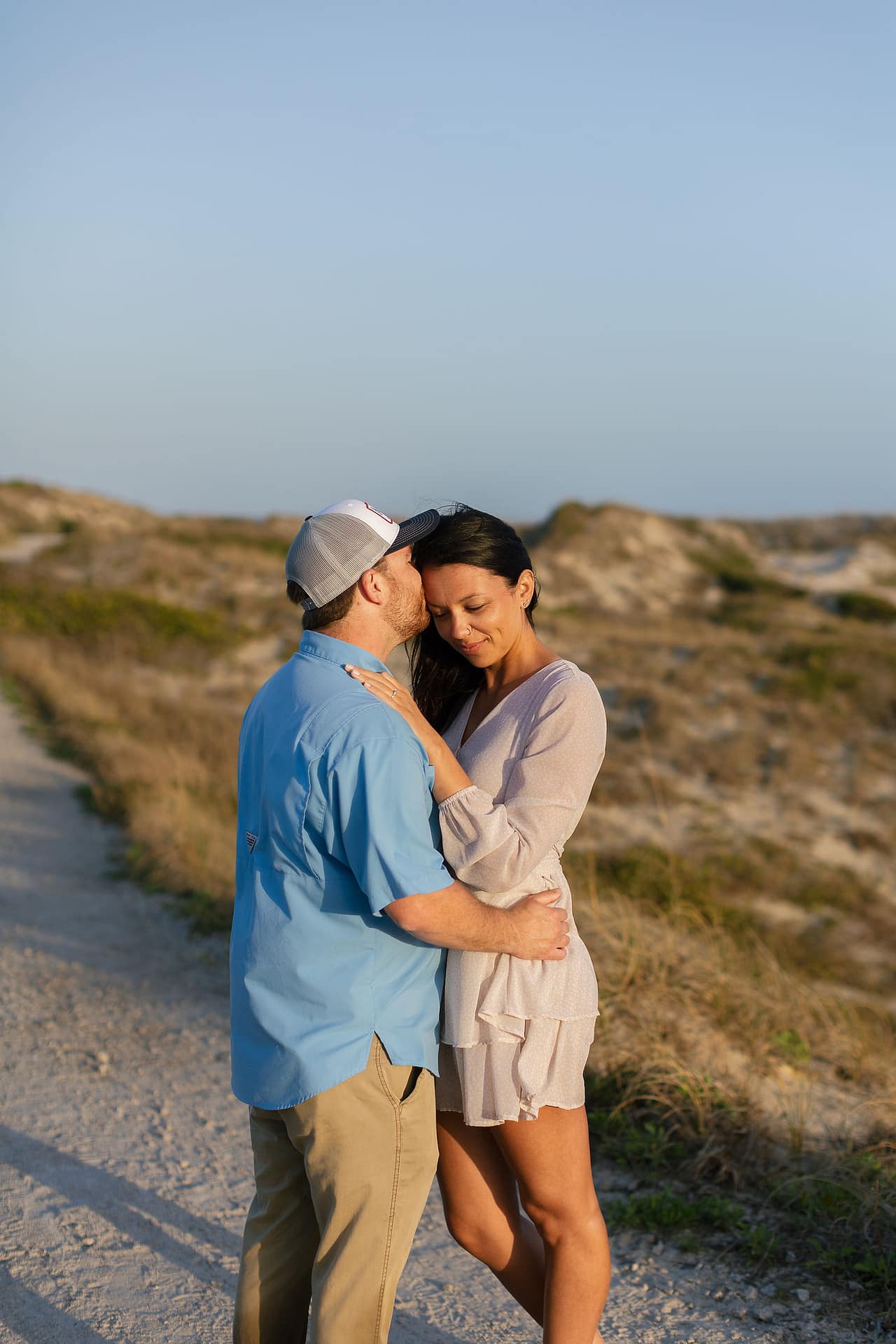 Authentic emotion captured during Atlantic Beach engagement session