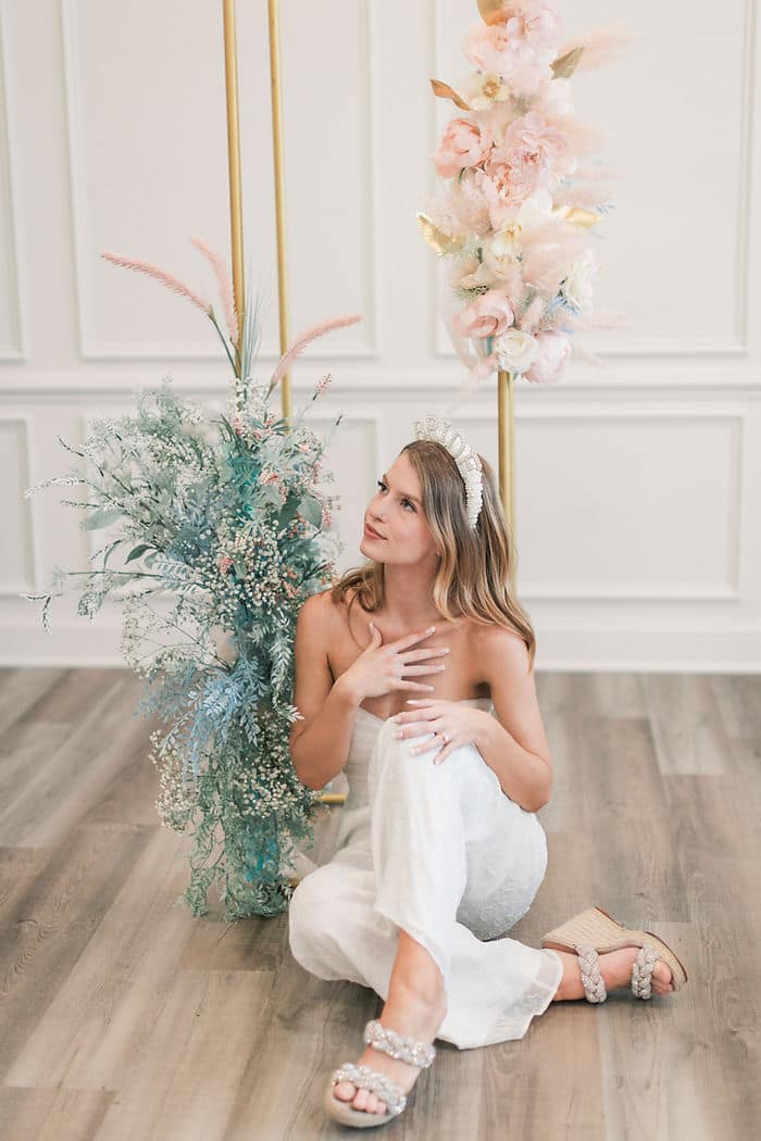 A wedding DIY floral stand for wedding backdrop in this bridal studio session