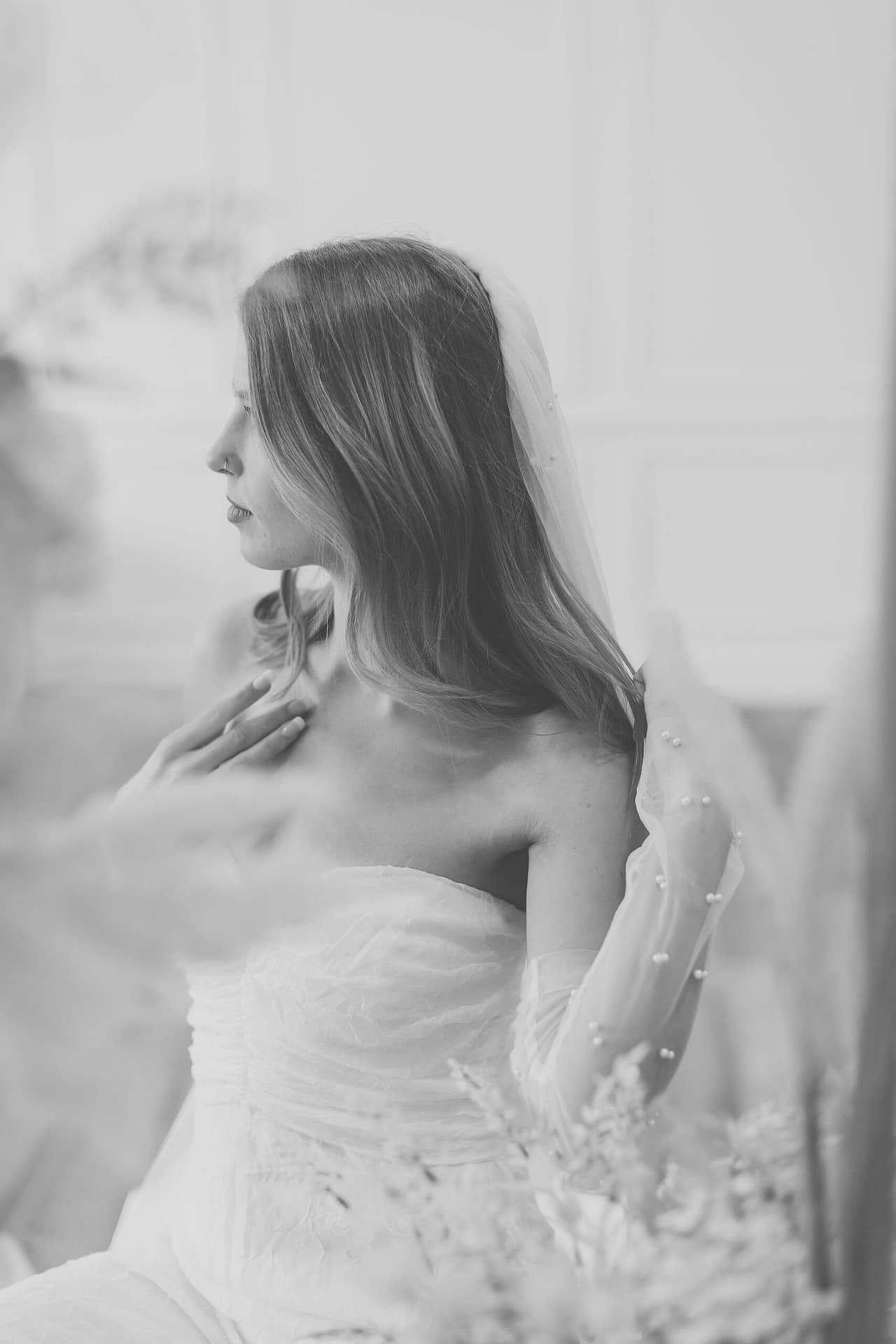 Dainty pearl studded gloves and pearl inlayed wedding veil